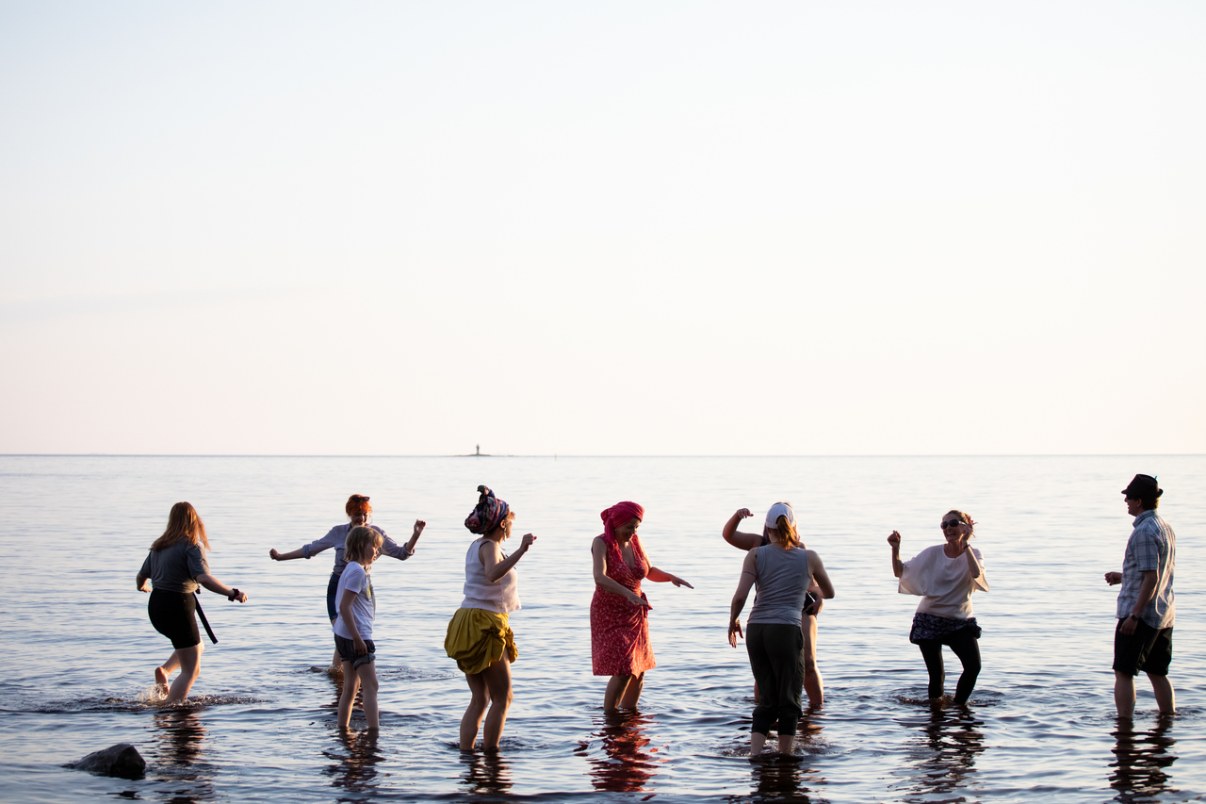 People dancing in the sea