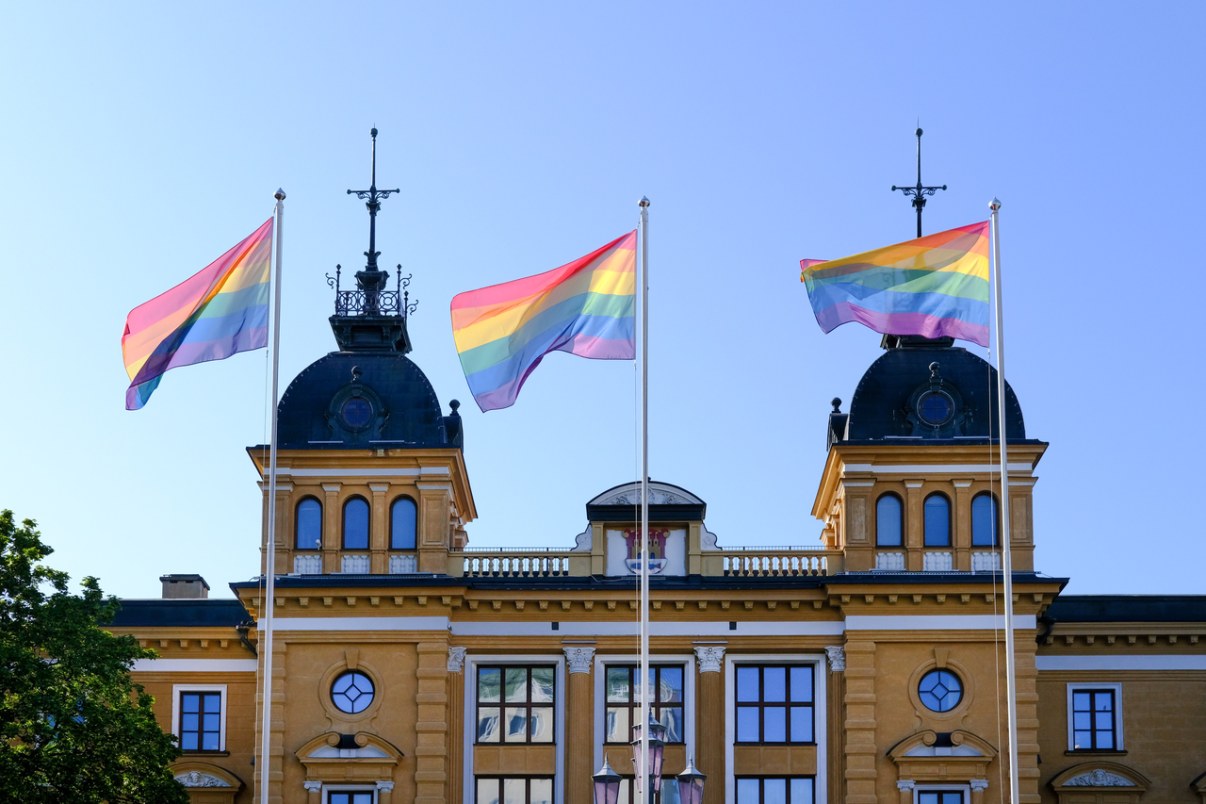 Pride flags in front of the City Hall